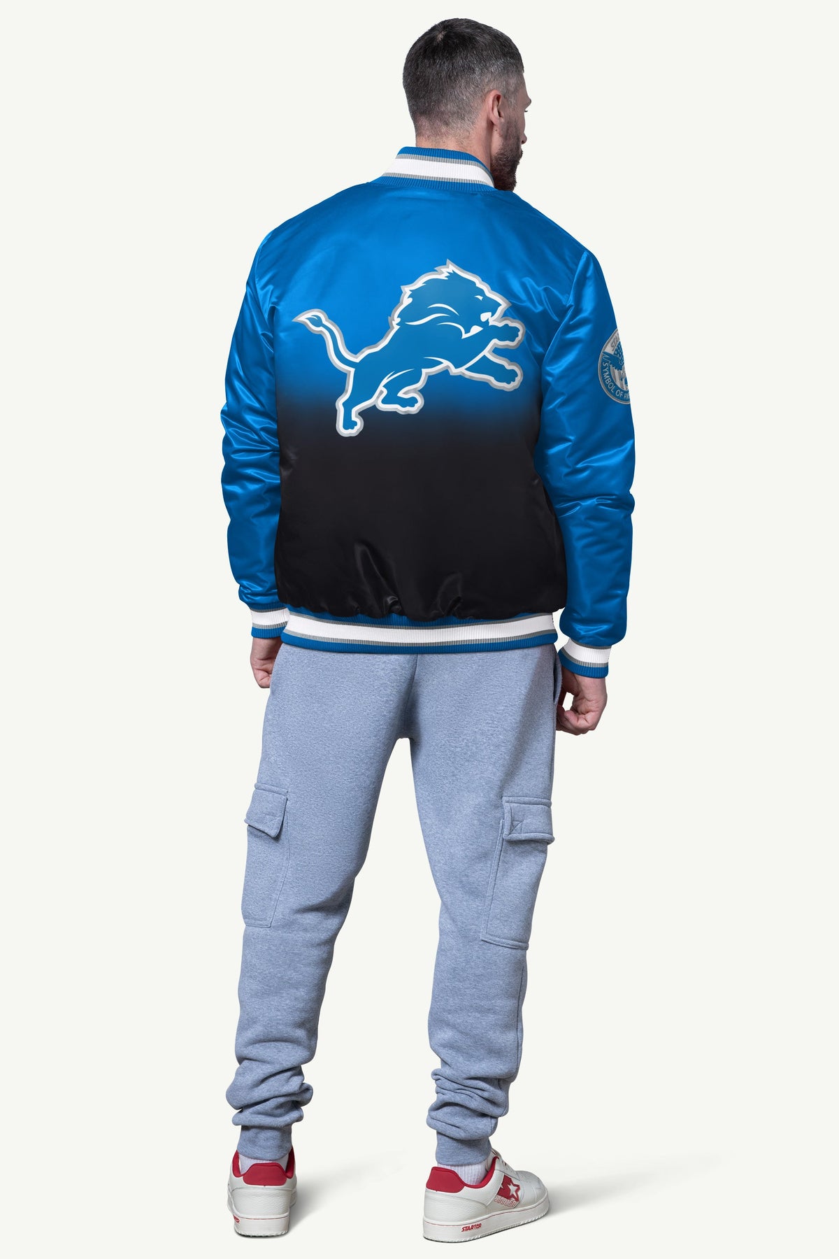 Starter Latest | MENS DETROIT LIONS PASS RUSH SATIN VARSITY JACKET